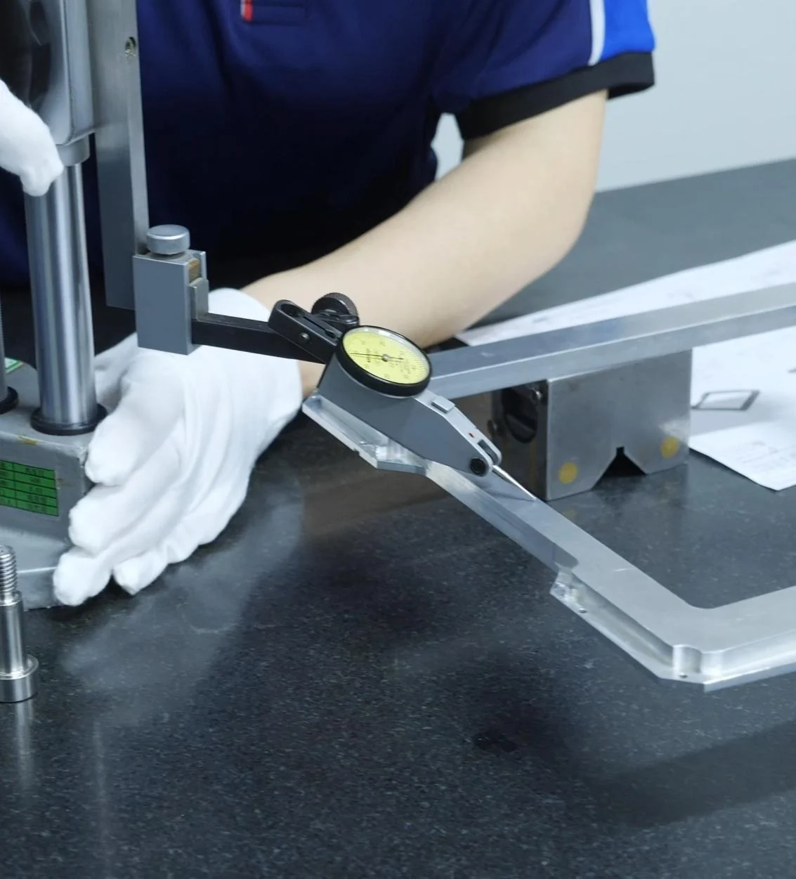 Manual height gauge inspection of a representative machined part