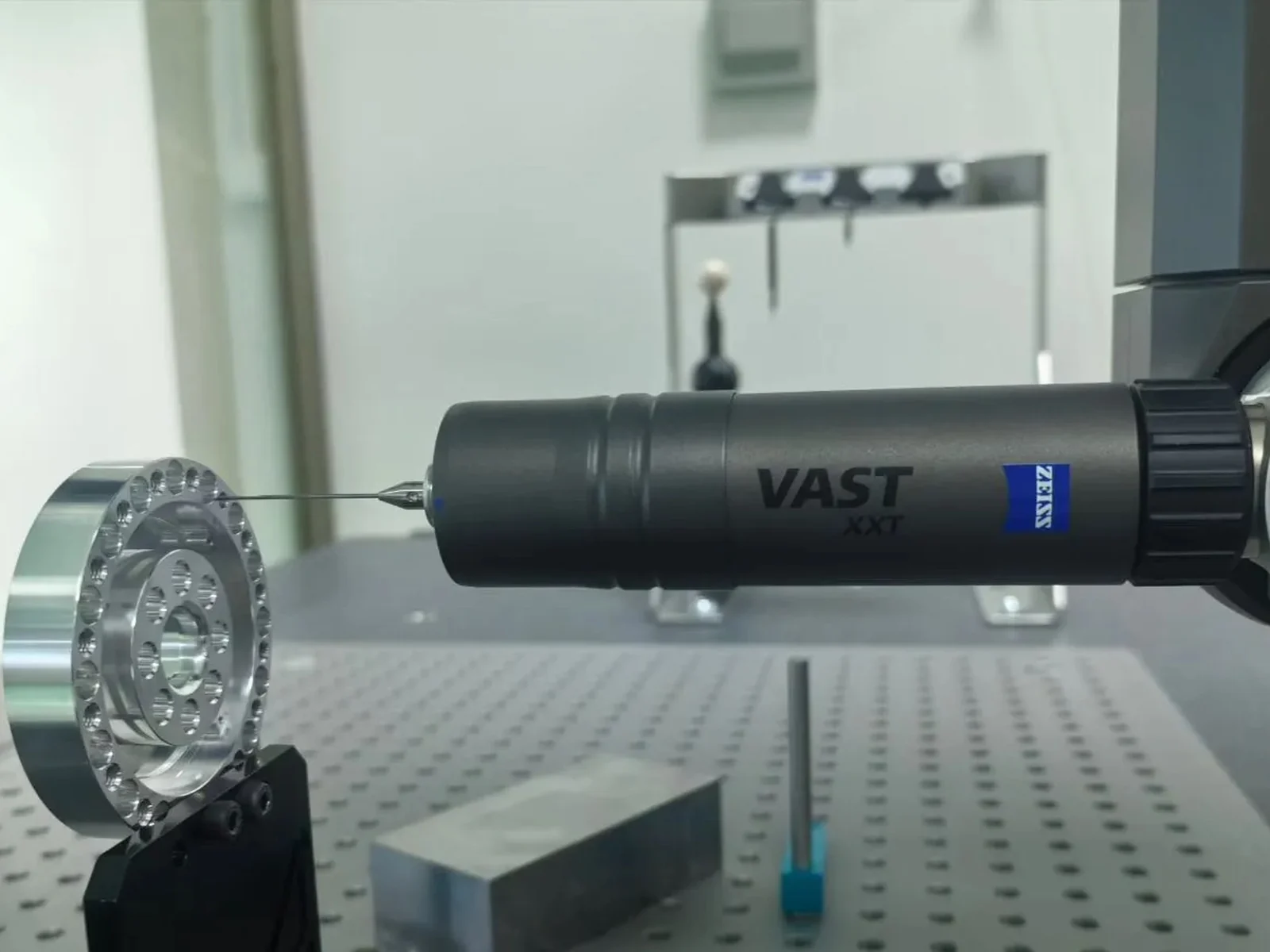 CMM probe measuring a representative machined component