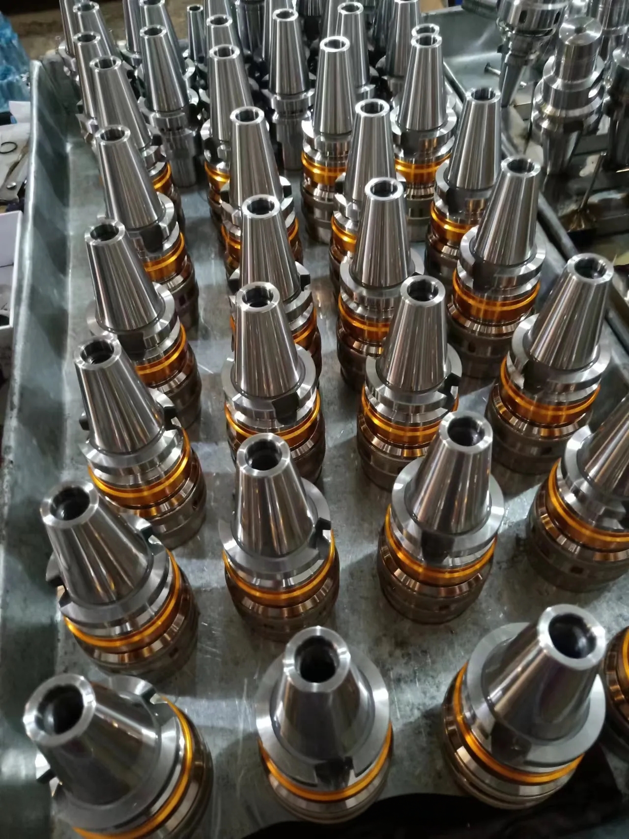 CNC taper toolholders arranged for production and spindle-interface sourcing