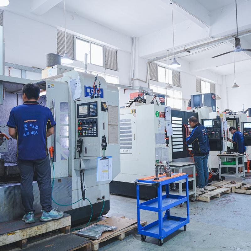 KAIAO manufacturing partner personnel operating CNC machines, from its company introduction